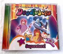 Load image into Gallery viewer, RARE ITEM!! Doodlebops Superstars CD (season two songs) &amp; Disney Music Block Party CD

